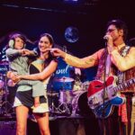 John Stamos Instagram - I thank my beautiful wife who knows how to throw a party - Fake Beatles, @raintribute (the best Beatles band ever!) Real Beach Boys, @mikeloveofficial @jamieleecurtis handing out @stamos bracelets, @glenpowell riding some big cow-like animal, all my friends, family, (party crashers) it was a 60’s party that was better than the actual 60’s ! 📸 @micalaaustin @canyonagoura THANK YOU!
