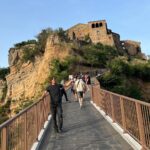 Johnny Knoxville Instagram - I have been meaning to post this for a while but because of the SAG strike I could not. I had the great pleasure of traveling in and around Rome with my old friend @bigbaldhead on his show #ride on @amc_tv. We visited Civita di Bagnoregio, a breathtaking 2500 year old Etruscan village which is eroding off the top of a hillside. A girl biker gang gave us a tour of Rome and best of all Norman and I had a chance to have some beers and catch up for the first time in many years. I sure am proud of him and all he keeps accomplishing, and had a flaming ball appearing on his show. ❤️