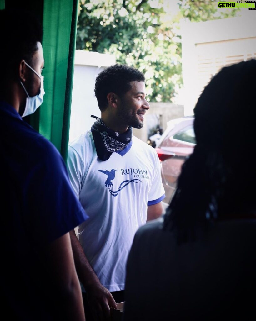 Jussie Smollett Instagram - Blessed to be back with my #RuJohnFoundation family. Brought my youngins @jocquismollett & @artbyalyx to #KingstonJamaica where they were able to join the other beautiful volunteers to feed hundreds of our houseless sisters and brothers. We then joined the brilliant doctors for a medical clinic for high schoolers, a backpack drive with supplies and sneaker giveaways. Thank you Mr. & Mrs. Bachelor for all you consistently do. This is our first trip back to Jamaica since Covid. I’m humbled and honored that my company, SuperMassive, has come in as a full sponsor and I have been able to underwrite these events. I don’t take lightly how blessed we are. Just glad to get back to doing what we do. One love. 🇯🇲 Kingston, Jamaica