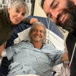 Justin Baldoni Instagram - Cautionary tale and a reminder to trust your intuition: We had a little scare with dad (@sambaldoni ) this week…Appendicitis! My mom called her local doctor (who temporarily won’t be named as long as she returns my call 🤨) and told the receptionist my dad had stomach pain, a low grade fever, and diarrhea. They said because his symptoms sound like COVID they couldn’t see him until Friday… 48 hours later! He’s 73. My mom trusted the Dr. office, I mean why wouldn’t she? Surely if these symptoms sounded dangerous they would get the doctor on the phone right? Nope. Something felt off, my aunt called me worried too. So I called our friend @jeneralwellness at around 7pm. She said to absolutely NOT wait and to get him to the ER as it sounded like appendicitis. Thank God we did. After spending all night in the ER (did you know ER’s are always busier during full moons?) Dad had an emergency appendicitis surgery Thursday morning. Had he waited …it could have been bad. Now he’s back home and doing great thank God! Look at this man- even at 5am, an hour before surgery he looks like a movie star! Moral of the story, if you feel something is off… trust it and do whatever you can to get a second opinion or at least get the right person on the phone. Life is too short. Everyone might be doing the best they can, but sometimes THEIR best isn’t enough. And a special shout-out to the wonderful staff and surgery team at SB cottage hospital for taking such good care of my daddy! You made him feel so safe and comfortable despite how busy you were. If you’re still reading this- send my dad a little love and good energy as he recovers. Any surgery at 73 isn’t easy and we so appreciate all the love! Santa Barbara Cottage Hospital