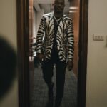 Kamaru Usman Instagram - What a ride!!! All I can say is I’m grateful 🤲🏿🫶🏿 📸 @patty_cuts Styled: @ugomozie London, United Kingdom