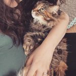 Kat Dennings Instagram - another forced cuddle in the books