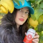 Kat Dennings Instagram – 🚨@DRINKSPINDRIFT HAS A NEW FLAVOR🚨 It is the deliciously tantalizing Blood Orange Tangerine and it’s CRUCIAL to sip it under a tree while the warlock of lemons watches you in fury. The flavor, much like my chosen picnic location, is #anythingbutordinary 🍊#spindrift #spindriftpartner