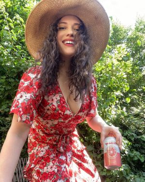 Kat Dennings Instagram - IS THAT A GENUINE SMILE COMING OUT OF MY FACE?! IT IS THE SMILE OF SOMEONE WHO FINALLY HOODWINKED HER FAVORITE BEVERAGE INTO SPONSORING HER…IT’S SPINDRIFT SPARKLING WATER, BABY. Never in my life have I approached a brand ASKING to partner with them out of sheer adoration. As a passionate (yet not remotely professional) gardener, I’ve become obsessed with only allowing REAL FRUIT (not “natural flavor” - actual fruit) into my consumables. Once I realized that everything I was drinking was “flavored”, I went on the hunt. I discovered @drinkspindrift which is the FIRST sparkling water made with 100% ONLY REAL SQUEEZED FRUIT and I became an absolute psycho, slowly converting my friends and family to the Drifter lifestyle. I may be part Spindrift at this point, as it is actually the only water I drink. Anyway. More to come. #realfruittastesbetter #spindriftpartner