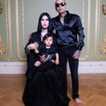 Kat Von D Instagram - Swipe to watch our little family grow older! 🖤 Since Leafar was born, @prayers and I have made it our annual tradition to take a family photo around the same time every year. Our goal is to fill my collection of Victorian oval frames we have in a section of our home with a new photo every year, documenting our family growing together — our little spin on The Picture of Dorian Gray. It’s gonna be so cool to see this collection of portraits side by side decades from now when we are old and grey and Leafar will be too big to sit on my lap!