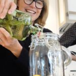 Katie Couric Instagram - We know it’s not a margarita for National Margarita Day, but this spicy paloma punch from @lideylikes has tequila in it, so it kinda counts, right? Palomas just happen to be my favorite drink of choice so a spicy spin on this beverage is just what the doctor ordered! 🍹🤪😋 It’s 5 o’clock somewhere, right? P.S. Run, don’t walk, to pre-order Lidey’s cookbook, Cooking in Real Life, out March 12th. And be on the lookout for more fun recipes from Lidey - coming soon to Good Taste, our newsletter made for foodies! Subscribe at the link in bio :) #tbt ​​Spicy Paloma Punch recipe (Makes 12 to 14 drinks) - 4 cups freshly squeezed grapefruit juice (about 8 grapefruits, or bottled) - 1 (750 ml) bottle good-quality tequila blanco or reposado - 3/4 cup freshly squeezed lime juice (about 6 to 8 limes) - 2/3 cup strained Jalapeño Simple Syrup (recipe follows) - 1 grapefruit, quartered and thinly sliced crosswise, for serving - 1 lime, thinly sliced, for serving - Ice, for serving - 1 1/2 cups unflavored sparkling water - 12 to 14 slices candied jalapeño (from the simple syrup), for serving 1. In a large glass pitcher or punch bowl, combine the grapefruit juice, tequila, lime juice, and simple syrup and mix well. Add slices of grapefruit and lime to the pitcher and store, covered, in the fridge until you plan to serve the drinks. 2. Serve the punch in ice-filled glass tumblers, topped with a splash of sparkling water, a piece of candied jalapeño, and a slice of lime or grapefruit from the pitcher, for garnish. ————————— Jalapeño Simple Syrup recipe (Makes 1 1/2 cups) - 1 cup thinly sliced jalapeño peppers (3 to 4 medium peppers) - 1 cup granulated sugar 1. In a small saucepan, combine 1 cup water and the jalapeños and bring to a boil over high heat. Reduce the heat to low, add the sugar and stir until it’s completely dissolved. Simmer the syrup for 5 minutes over medium heat, until slightly reduced. Set aside for at least 1 hour to cool completely. 2. Store in a sealed container in the refrigerator. Remove the candied jalapeños after 1 hour and store separately until you’re ready to use. The longer the peppers sit in the syrup, the spicier the syrup will be.