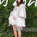 Kaya Scodelario Instagram - I have so many wonderful people to thank for helping me feel confident enough to attend to British Fashion Awards at 8 and a half months pregnant last night @ginakanemakeup & @eamonnhughes you’re both stars. @leithclark Thank you for finding me the most perfectly fun @bora_aksu dress. I felt like the shiniest Christmas bauble in the land ✨ My wonderful @cartier family for a great night at a wonderful table meeting friends old and new. And the kind people (including the brilliant PR ladies on the carpet & @jamesmcavoyrealdeal ) that helped me up and down the stairs all night. I’ve had a bit of a crappy pregnancy and it was really special to have last night as a memory of this time - thank you all 💜 Yes I know I look like a HOUSE from the side but screw it, I felt bloody amazing 💅🏻💃 Royal Albert Hall