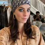 Kaya Scodelario Instagram - Little #TB to my @zoomagazine shoot a few weeks ago wearing the @dior headscarf & robe of my murderous-wife-of-cheating-rich-husband-in-Italy fantasies, shout out to the WONDERFUL @justinplz in the background. Such an amazing stylist to work with, talented and super down to earth. Hope our paths cross again 💜💜 Shoreditch Studios