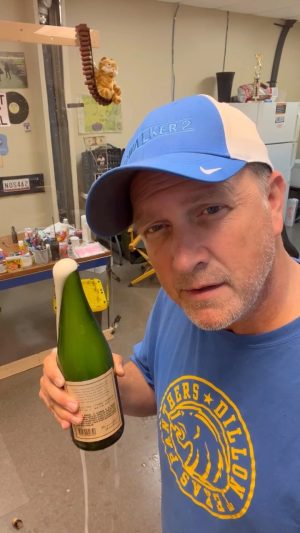 Keegan Allen Instagram - Sabering Champagne for a TV Show #props #setlife #filmmaking @molly7hagan @jaredpadalecki