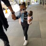 Keshia Knight Pulliam Instagram - This little super star is living her best life walking down the street with her @spelman_college t-shirt, @mareblula shade & her @alumpofsugarboutique jacket!! She is SOOOO serious... What have I created?!?!? 😂😂😂 #MyMiniMe