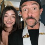 Kevin Smith Instagram - The Jersey Girl came to see JERSEY GIRL! @raquelxcastro paid a visit to my beloved @smodcastlecinemas to cap off a Memorial Day weekend full of shows! On Friday, we showed JAWS as part of the Movies That Made Me series. Then on Saturday night, we watched my flick RED STATE. But Sunday saw a reunion with the little girl who, at age 7, preternaturally played the role of Gertie in my sixth flick. We screened what we were calling JERSEY GIRL: The Snyder Cut, because it was the longest version of the flick ever edited, with an entire first act full of @jlo that got cut out due to post-Gigli hysteria. I haven’t seen any cut of JG since 2006, so it was a trip to see the movie I originally made #bennifer two decades ago. Hopefully, @paramountplus will want to stream it in 2024 for the 20th anniversary. It’s almost an entirely different flick. Also entirely different: Raquel, who’s now about 2 years younger than her cinematic Dad #benaffleck was when we shot it. I was happy to discover our troubled film didn’t ruin Rocky, who grew up to be such a wonderful kid with a great head on her shoulders. I can’t thank her enough for a killer kid performance, as well as for making the trip all the way from L.A. to be at #smodcastle with an ardent audience. It was a lovely weekend (with 3 profitable pre-show auctions, thank you bidders), during which I got to wear a trio of different jackets, as well as my new Smodcastle sneakers made by @1craftypunk! Next up: BABBLE-ON this Saturday and WATCH WITH KEV: @dctheflash on June 15, 16 & 17! Tickets available now at SmodcastleCinemas dot com! Take a trip to Smodcastle, where the movies come to play! #KevinSmith #smodcastlecinemas #raquelcastro #jersey #newjersey #film