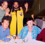 Kevin Smith Instagram - 20 years ago today, my Dad died. So this morning, my brother Don and I took our Mom to church. Shockingly, the roof didn’t cave in on the director of DOGMA. The mass was celebrated in memory of Pop - a man who shaped my life, both literally and figuratively before he left this world. Two decades back, my whole family happened to be in Philadelphia at the same time - so they all came to my #wizardworldphilly Q&A. After the Q&A, we went to dinner at @mortonssteak: @jenschwalbach, me, Dad, Donald, @donsgirlgrace, @virginia_in_vienna & her husband Eric (Don’s husband Jerry was stuck in Florida), where we had the time of our lives for the last time in his life. After a memorable meal with the family he co-created, Dad died in the wee hours of the following morning, June 1, 2003. A portion of his ashes have resided with me since his cremation, as a constant reminder of the quiet patriarch without whom I wouldn’t even exist. My sister has long maintained that I based Silent Bob on Dad - the guy who said very little unless he had something funny or insightful to impart (ironically, that would mean Jay is based on my Mom). I don’t know if I got Silent Bob from Dad, but I got nearly everything else. In the pic of me at the lectern, the bald spot in the front row is my Father - who fed me Standup comedy albums as a kid and loved to watch me talk to a crowd, knowing those records made an impact on his youngest son. While growing up, Dad took me to the movies all the time too - so he likely knew both my careers as a storyteller came indirectly from his unintentional influence. I’m happy he got to meet @harleyquinnsmith (he was a big fan), but he’s been gone twenty years and I still miss him. So if you can (and if you wanna), hug your Dads for me today, Kids. And if you’re in Toronto on Friday or Jersey on Saturday, come see me at the @sandersoncentrebrantford or @smodcastlecinemas. That sounds like a self-serving plug because it is - but it’s also in memory of a guy who’d still be in the front row watching me if he could. Miss you, Pop. Rest in Power. #KevinSmith #dad #mementomori
