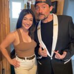 Kevin Smith Instagram - The Jersey Girl came to see JERSEY GIRL! @raquelxcastro paid a visit to my beloved @smodcastlecinemas to cap off a Memorial Day weekend full of shows! On Friday, we showed JAWS as part of the Movies That Made Me series. Then on Saturday night, we watched my flick RED STATE. But Sunday saw a reunion with the little girl who, at age 7, preternaturally played the role of Gertie in my sixth flick. We screened what we were calling JERSEY GIRL: The Snyder Cut, because it was the longest version of the flick ever edited, with an entire first act full of @jlo that got cut out due to post-Gigli hysteria. I haven’t seen any cut of JG since 2006, so it was a trip to see the movie I originally made #bennifer two decades ago. Hopefully, @paramountplus will want to stream it in 2024 for the 20th anniversary. It’s almost an entirely different flick. Also entirely different: Raquel, who’s now about 2 years younger than her cinematic Dad #benaffleck was when we shot it. I was happy to discover our troubled film didn’t ruin Rocky, who grew up to be such a wonderful kid with a great head on her shoulders. I can’t thank her enough for a killer kid performance, as well as for making the trip all the way from L.A. to be at #smodcastle with an ardent audience. It was a lovely weekend (with 3 profitable pre-show auctions, thank you bidders), during which I got to wear a trio of different jackets, as well as my new Smodcastle sneakers made by @1craftypunk! Next up: BABBLE-ON this Saturday and WATCH WITH KEV: @dctheflash on June 15, 16 & 17! Tickets available now at SmodcastleCinemas dot com! Take a trip to Smodcastle, where the movies come to play! #KevinSmith #smodcastlecinemas #raquelcastro #jersey #newjersey #film