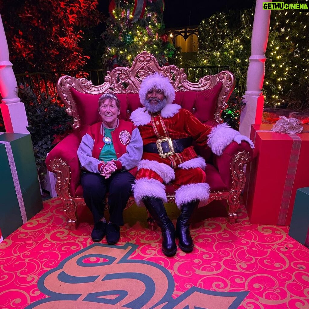 Kevin Smith Instagram - HAPPY 78th BIRTHDAY, MOM! It was a rough year for @donsgirlgrace, with far too many hospital stays. So to celebrate her victory over the infinite, we took Mom to @waltdisneyworld for her birthday today! All she wanted was a photo with Santa and cotton candy, so she got both. I’m grateful to ring in another year and she was ecstatic to spend the day with her kids, her granddaughter, and her niece. #KevinSmith