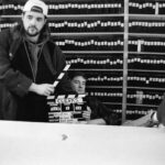 Kevin Smith Instagram – Yesterday was the 29th anniversary of the theatrical release of my first flick, Clerks! So now, Clerks is older than the entire cast and crew were when we made Clerks. And the flick is leaving it’s 20’s soon: in January, it will be the 30th anniversary of Clerks debuting at the #sundancefilmfestival.
Thank you to everyone who has ever, as the kids say, fucked with our l’il black & white movie! On a related note, @originalfunko is releasing @clerksmovie Pops, featuring new versions of old favorites @jayandsilentbob as well as the #funkopop debuts of Dante, Randal and Elias! #KevinSmith #clerks #clerks3