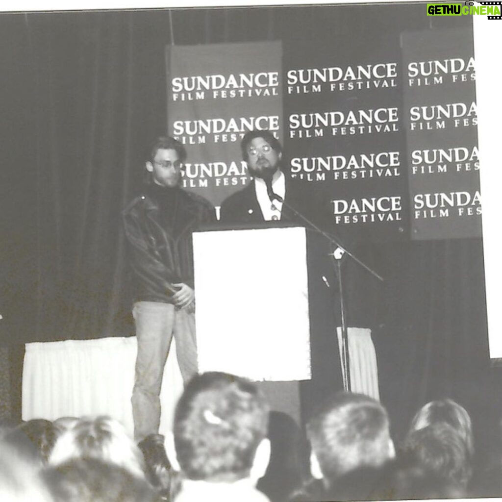 Kevin Smith Instagram - HAPPY CLERKS DAY! 30 years ago from today, CLERKS debuted at the 1994 Sundance Film Festival! That means, if you ever wanted to stop me or my career from happening, youʼd send a Terminator back to this moment in time 3 decades back. Mercifully, there was no robotic hunter/killer trying to kill me at Sundance that year. The inaugural screening took place at the Holiday Village Cinema in a sold out 150 seater. That was the first time I got to see my first film with a full audience. The sheer thrill of finding out that ideas Iʼd had years prior actually held up to public scrutiny from strangers was intoxicating (but that also might have had something to do with the thin air at the high altitude). That first screening started the buzz that powered the next three screenings and a deluge of press about the black and white New Jersey convenience store movie and the director who was going back to work there after the Festival ended. By our fourth and final Sundance screening at The Egyptian Theater on Main Street in Park City, Clerks was being talked about and written about like it was well worth watching. As he introduced me and the film, Festival head Geoff Gilmore described me in a way that still gets me in the feels when he said “If Kevin Smith didnʼt exist, the Sundance Film Festival wouldʼve had to invent him.” Mine was a Cinderella-ish or Rocky-like tale that reminded folks anyone can take a shot at their dreams and maybe find a modicum of success - even if theyʼre from New Jersey. Do you have a dream (one that doesnʼt involve hurting people or animals, destruction or death)? 2024 is the year you move closer to your goal and take your shot on yourself. Many thanks to Brian, Jeff, Jay, Marilyn, Lisa, Scott, Dave, Kim, Virginia, Donald, Mom, Dad, the Thapars, and everyone else who helped me craft Clerks! Many thanks to Sundance, Mark Tusk, Bob Hawk and John Pierson for guiding a gobsmacked newcomer in his sudden success. And many thanks to you, my friends, for 30 years of continued interest in the Askewniverse adventures of retailing rascals Head over to JayAndSilentBob dot com TODAY to shop our anniversary sales! #KevinSmith #clerks #film