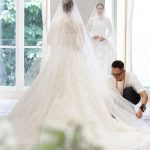 Kimberly Ann Voltemas Instagram – Accompany the luminous bride, Thai ambassador @Kimmy_Kimberley, for her final fitting as she joyfully slips into her one-of-a-kind, couture wedding gown designed by @MariaGraziaChiuri. The finishing touches are orchestrated by a team of expert seamstresses in the Dior Ateliers, to ensure a flawless fit that gracefully embraces her silhouette. Every inch is adorned in a dreamy flourish of opulent floral guipure in soft shades of ivory and beige, culminating in a play of light and transparency. The reveal is a tribute to bridal dreams and a testament to the excellence of #DiorSavoirFaire.
© Photo: Sophie Carre