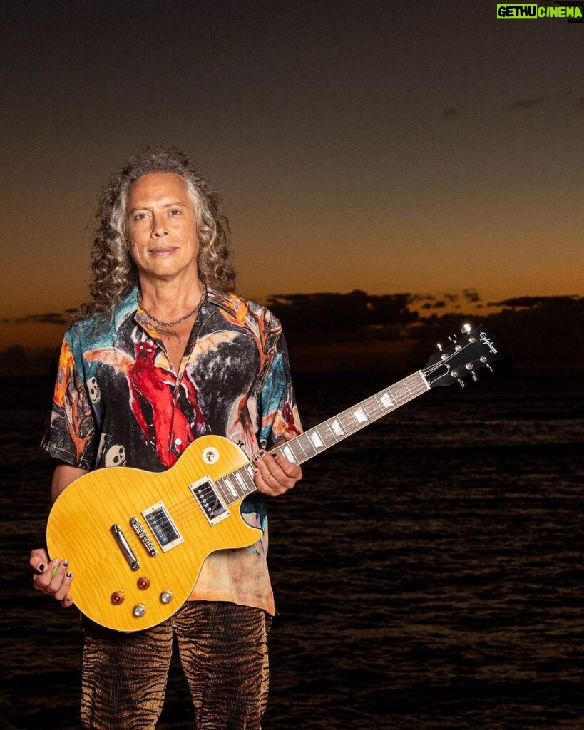 Kirk Hammett Instagram - We are thrilled to introduce the new Epiphone Inspired by Gibson Custom Shop @kirkhammett “Greeny” 1959 Les Paul Standard, built upon the legendary original and debuting for the first time on a core model, a Gibson-Style “open book” headstock. “Greeny” is famous for both its incredible story and its iconic sound. Originally owned by Peter Green, Greeny was used throughout his time with Fleetwood Mac and started as a bright cherry red sunburst, but after countless shows, it faded to a pale yellow color. Its distinctive sound is partly from the out-of-phase middle switch position due to the neck pickup’s reversed magnetic polarity. In the 1970s, Peter sold Greeny to Gary Moore, who used it for three decades with Thin Lizzy and as a solo artist, even recording an album titled “Blues for Greeny.” After years together, Greeny was sold and temporarily retired, left waiting for a chance to return to the stage. Enter Kirk Hammett. Kirk is no stranger to the pursuit of the perfect guitar, but in the case of Greeny, it was as if this guitar was destined for him. It took all of 30 seconds of playing for Kirk to understand the magic. Now owned by Kirk Hammett, Greeny has officially passed through the hands of three legendary guitarists. Now YOU can wield the magic of “Greeny!” head to the link bio to join the list of legends. 📸: @rosshalfin #epiphone #foreverystage #kirkhammett #greeny #lespaul