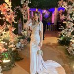 Laila Ahmed Zaher Instagram – From yesterday’s wedding 💗 

Dress: @bycherry_mustafa 
Stylist: @mayajules 
Makeup: @dinaelkasheff 
Hair: @alfredmakram 
Jewelry: @iramjewelry_ 
Clutch: @treasure_box_by_rashmaa
