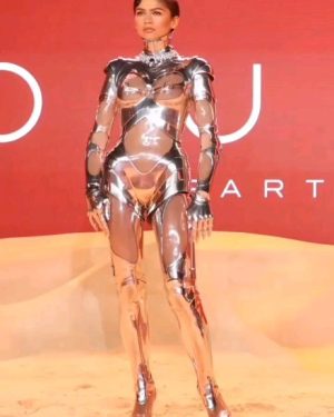 Laverne Cox Instagram - I mean!  Just Wow! Zendaya wearing the truly groundbreaking, iconic  Maschinenmensch
 from @manfredthierrymugler's f/w 1995 20th anniversary collection  Cirque d'Hiver. Mr. Mugler’s Maschinenmensch or Machine-Human is inspired by the fictional robot of the same name from the 1927 German film "Metropolis." "Metropolis" has inspired many artists over the years including me for my latest music project dropping February 23, just a week away.  Get ready honey!
...
I am aware of many artists and models wearing this fembot couture for photo and video shots. But I am not aware of anyone ever wearing it on a red carpet. @zendaya @luxurylaw this is just so incredibly divine. Seeing this piece on a red carpet in 2024 is a beautiful reminder of how simultaneously Mr. Mugler was ahead of his time and truly timeless. This year we celebrate 50 years of the Mugler brand. The party has officially started honey.  Thank you Law, Zendaya, @cadwallader and everyone at @muglerofficial for this beautiful moment.  This makes me so very happy!
...
#ThierryMuglerVintage 
#ThierryMuglerArchives 
#Muglerized 
#Muglerette
#ThierryMugler