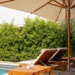 Lesley-Ann Brandt Instagram - Not to be outdone, the Atlantis umbrella by @skagerak has been a godsend in this heat. #skagerak #pool #backyard #gifted