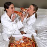 Lily Aldridge Instagram - PJs + Pizza = 💃🏽🪩🍕 Love you @mirandakerr 🥰 The Carlyle, A Rosewood Hotel