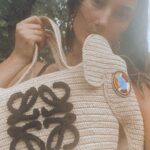 Lily Aldridge Instagram - This @LOEWE Elephant basket bag has been created in collaboration with the #KnotOnMyPlanet campaign. Its eyes are hand-beaded by Samburu craftswomen 🐘 The proceeds go to the @ElephantCrisisFund, helping to secure a future for elephants 🫶 Did you know... that elephants lie down for an average of 2 hours a night and snooze during the day standing up 🥰 Shop yours on loewe.com #LOEWEkomp #KnotOnMyPlanet @samburutrust @knotonmyplanet @jonathan.anderson
