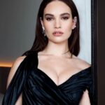 Lily James Instagram - 🖤 @donatella_versace 🖤 @versace 🖤 Travelling band @halleybrisker @sofiatilbury @charlottetilbury 🖤 And @pipbourdillon 📷
