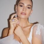 Lily James Instagram - Friends and fashion With the greatest @charlottetilbury ✨ Styled by 🧚‍♀️ @rebeccacorbinmurray Wearing @rodarte masterpiece Makeup @valeriaferreiramakeup Hair @halleybrisker Nails @michelleclassnails Jewells - @boucheron @onlynaturaldiamonds Shoes - special @charlotteolympia Cinderella slippers ! 🤍 #britishfashionawards