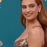 Lily James Instagram - @donatella_versace this dress is out of this world. I love every tiny detail. Golden chain mail at the Emmys 🙏 Thank you so much. I will never ever forget it, love you! And thank you to everyone who poured their talent and skill into making this sensational dress. A dream. @versace forever 🤎🤎🤎