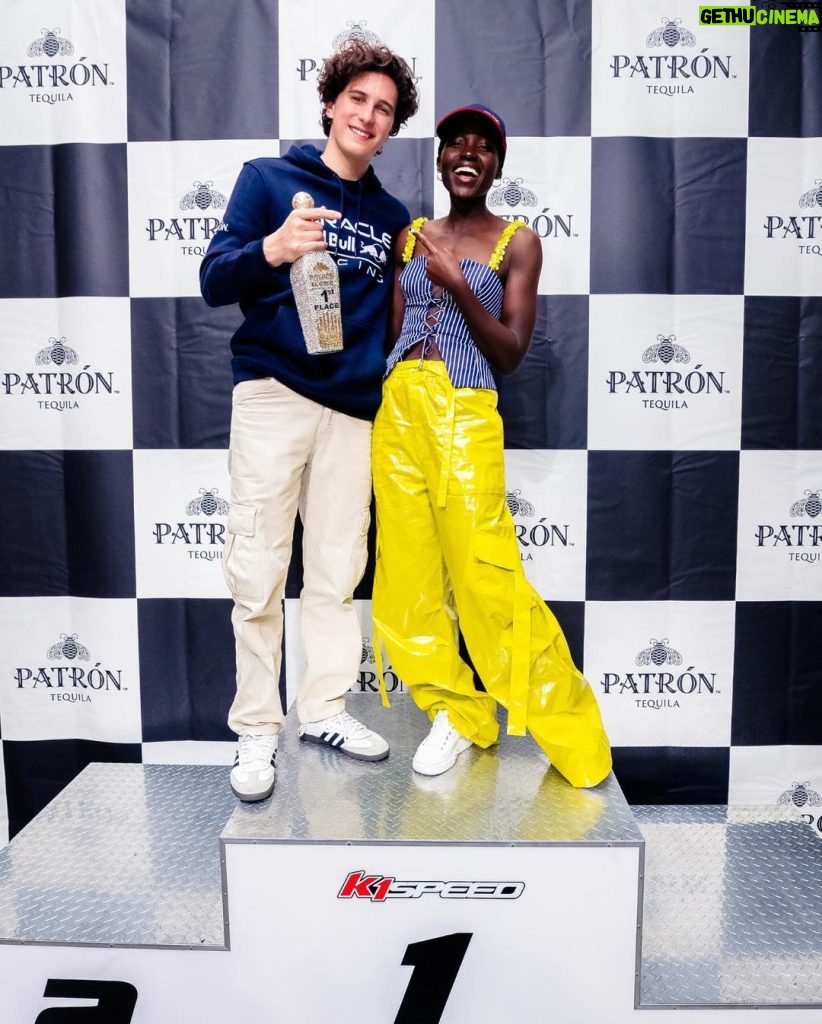 Lupita Nyong'o Instagram - Zooming through #f1weekend with @patron 🏎🏁 #patrontequila #patronpartner