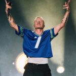 Macklemore Instagram - The Ben Tour USA made its way back home to Washington and a city that I have grown to love over the years: Spokane. It reminds me of Seattle back in the 80’s before IKEA looking condo’s and tech took over. There’s a nostalgic Americana vibe from old brick buildings, wide streets, incredible vintage missions, the Spokane river and rustic diners. Sloane and I put in miles on Lime Scooters riding all over the city and exploring the uncharted terrain. I have classic core memories shooting the Downtown music video when Sloane was a baby and shutting down multiple city blocks to throw a parade with the people of Spokane. That same energy was felt from the moment I stepped into the Spokane Arena. Someone even tracked down the inflatable dog from the music video who made a cameo on stage during Downtown. 11,000 people deep and probably the loudest crowd of the tour. A true Washington homecoming in one of my favorite PNW places ❤️ Spokane, Washington