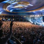 Macklemore Instagram - This tour I have fallen back in love with American venues. I had forgotten. They are sacred spaces that hold energy, stories, secrets, sweat, stained walls, beer riddled floors and stages that have been graced by giants who have come and gone. They are a gathering mecca for the medicine that is music and the magic that occurs in community. Speakers strapped to the ceiling over the heads of humans pressed up against each other screaming the words in unison. It has been life affirming to reconnect to this love. And when I think of venues in America one of my all time favorites is The Rave/Eagles Club in Milwaukee. It is perfect. In stature it is a 200,000 sq ft labyrinth, woven in tapestry’s, hidden hallways, lava lamps, a swimming pool, basketball court, an old bowling alley that was converted to a smaller venue and of course the main room. There is no air conditioning. It is way too hot. It is a place where performers will be tested as will the audience, and I revel in the challenge. The venue is almost 100 years old and is independently owned. Every time I play there I look forward to hearing stories from the owner Leslie who refuses to sell the place to the bigger companies that have attempted to buy it. She is a legend, a friend and a magnificent tour guide of the sprawling oasis. The swimming pool is decorated in graffiti from all the musicians that have stepped foot on this holy ground. I feel my brother Mac’s spirit in this space, as his eerily beautiful words sit beneath the 25 marker of the pool. It is truly a 1 of 1 and makes me proud that my fingerprints are part of its linage. This show marked my 3rd time there and also my 3rd time selling it out. We gave it 100% as always…It just means something more in Milwaukee ❤️ Milwaukee, Wisconsin