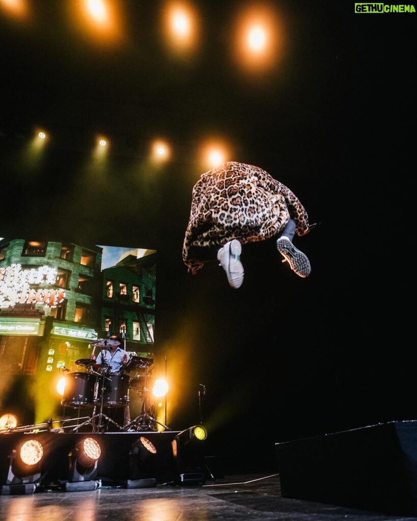 Macklemore Instagram - After a couple off days back in Seattle I landed in phoenix and was greeted by a sizzling 102 degree sun. I decided to dress up like a falcon wrangler. I met people outside that had been waiting since 9:30am to get in. We hugged, shed some tears and I felt really good in the spirit. The venue was air conditioned and dog friendly prolly. Just had that vibe that if you were a dog they’d let you chill in a hallway and give you a mini Mars bar or some shit. Anyway, I hit the stage in my falcon handling gloves and immediately felt restricted by the big tough leather covering my palms. After the first song they had to go. Bam! Threw them shits. The crowd was loose and nibble as was I, well hydrated and relatively sturdy. I was hitting a lot of spin moves to showcase how hydrated I actually was all while thinking in my head “You still got it my boy”. We laughed and some of my jokes hit. Some didn’t. Some people yawned. That always throws me off, so if you come to a show and you’re tired please hold that shit in. Anyway, the whole crowd was full of love and they sent us off stage with smiles and daps. Beautiful evening with the Cacti loving folks of Arizona. Next stop…LA for our finale show tonight.