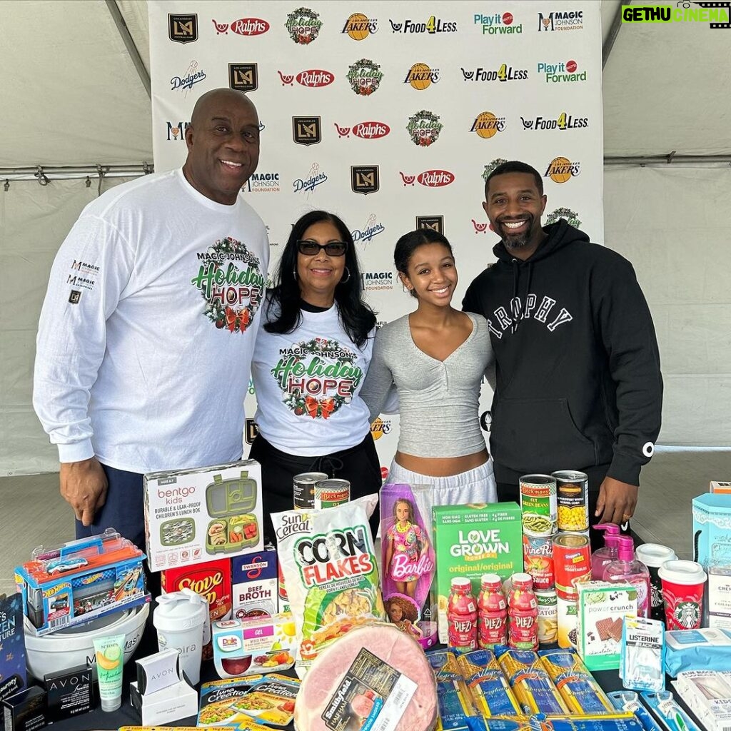 Magic Johnson Instagram - What an incredible day in Los Angeles! Cookie and I have been hosting our Holiday Hope event for almost a decade and it never gets old. Today we blessed another 800 families in need this holiday season with a 25-pound box of food, personal care items and AVON products provided by our great partners at Feed the Children. With the help of our amazing in-kind and corporate partners, families also received toys, protein snacks, eyewear, children’s books, canned food, ham and more! We can’t thank you enough for your time, kindness and support this holiday season! @feedthechildrenorg @faithfulcentral @Blueplanetecoeyeware @Powercrunch @Herbalife @Plezinutrition @Mattel @Campbells @StarKist @FarmerJohnLA @Bentgo @Dole @Lakers @Dodgers @LAFC @Rams @albalegacy @cricketwireless @commonspirithealthphilanthropy @skylar Thank you to our friends at @faithfulcentral and a special thank you to lead Pastor Dr. John-Paul C. Foster. Thank you to each and every single one of our volunteers for dedicating their time to serve the participating families and ensuring they have an amazing holiday season!! 📸: @bystokesla