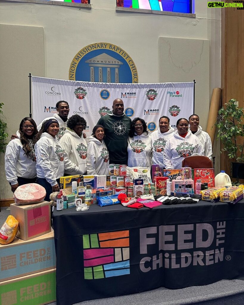 Magic Johnson Instagram - Another amazing Holiday Hope in the books, this time in my hometown Lansing, MI! We were able to feed and assist over 1,000 families and provide chips, chicken, ham, milk, bread, stuffing, soda, water, juice, toys, books, hats, cereal, protein bars, scarfs, backpacks, hygiene products, sweatshirts, turkeys, chicken broth, and canned goods. Thank you to the Magic Johnson Foundation and our incredible partners (Feed the Children, Concord Hospitality, Kroger, Mattel, Campbell’s, Frito Lay, Herbalife, One Warm Coat, Pepsi, Plezi, Power Crunch, SodexoMAGIC, Union Missionary Baptist Church - Pastor Kenny Craig and First Lady Corrie Craig) and our volunteers (Earvin Johnson Sr. Scholarship Recipients and Virginia State University) for supporting this important initiative. @feedthechildrenorg @concordhotels @pepsi @fritolay @blueplanetecoeyewear @powercrunch @herbalife @plezinutrition @krogerco @onewarmcoat @umbclansing @mattel @campbells @sodexomagic