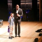 Magic Johnson Instagram - Last night I had the pleasure of speaking to 1000 people at Chapman University Business School about how I built my business and brand. I had so much fun and brought two young boys up on stage to sign their jerseys! Thank you to President of Chapman University Daniele Struppa and Dean of the Argyros School of Business and Economics Henrik Cronqvist for having me on hand to celebrate the tremendous gift from the Argyros family!