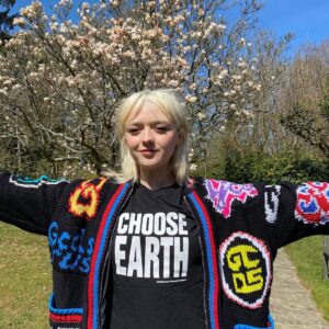 Maisie Williams Instagram - It’s Earth Day 🌎 and I ask you to CHOOSE EARTH! 

My friends over at @chooselove have launched a campaign raising desperately-needed funds for the incredible Brazilian indigenous leaders dedicating their lives to protecting the rainforest from destruction. This work is a vital part of the battle against climate change and is essential for the future of our planet. 

There’s the link in @chooselove bio to donate or you can buy one of these fabulous organic cotton tees (printed to order) and 100% of profits from the merch go to the Choose Earth fund! 

Protect our planet🌱 
Choose Love🤍 
CHOOSE EARTH!✨