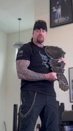 Mark Calaway Instagram - Want a chance to win this 30th Anniversary @wwe Championship Title autographed by yours truly? 

Head to the link in my bio and purchase your #BSK shirt today! I partnered with @ninelineapparel, a veteran-owned & American-made company, for the design of this shirt. 

Each purchase enters you in a chance to win this limited-edition title!