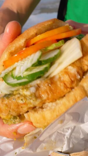 Mark Wiens Instagram - Bake and Shark! Most famous beach burger in Trinidad and Tobago! 🇹🇹 The freshness and seasoning makes it so good! #visitTrinidad @booktrinidad 📍Uncle Sam and Son’s #TrinidadandTobago #MaracasBay