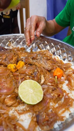 Mark Wiens Instagram - One of the national foods of Senegal 🇸🇳 is “poulet yassa,” chicken fried with a bucket of onions, hot mustard, and lime juice. So good!! #Senegal #SenegaleseFood #Africa