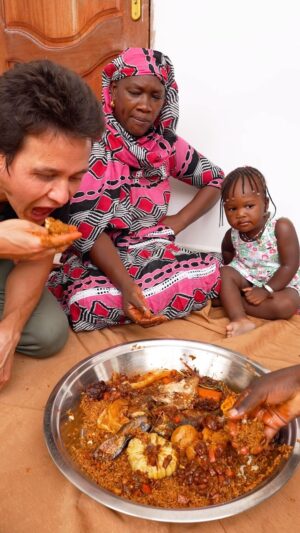 Mark Wiens Instagram - The king of West African food - Jollof Rice! Ever since I was a kid I’ve loved Jollof rice, so I was thrilled to finally go to Saint Louis, Senegal 🇸🇳 where it originates (where it’s called Thieboudienne), to taste the real deal! @papetatandiaye #Senegal #jollofrice #jollof