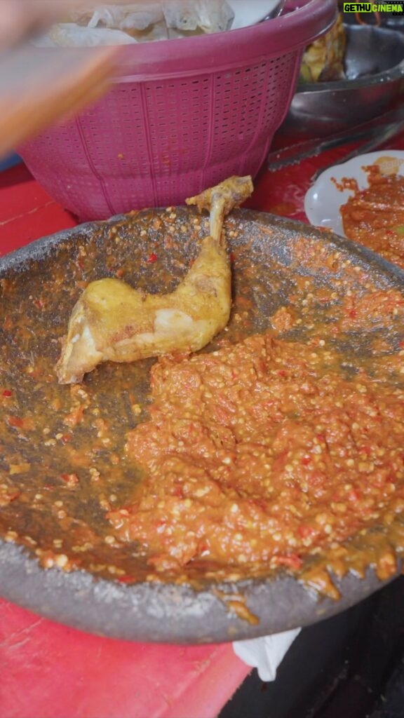 Mark Wiens Instagram - Ayam Penyet - “Squeezed Chicken” one of the tastiest Indonesian street foods, loaded with chili sauce! @budi_tarjo #ayampenyet #IndonesianFood #streetfood 📍 Depot Gito #Surabaya #Indonesia Surabaya, Indonesia