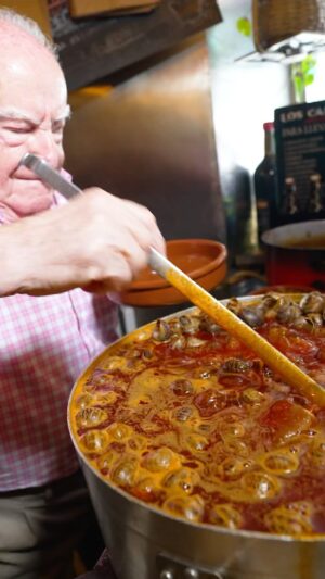 Mark Wiens Instagram - 93 Year Old King of Spicy Snails! 🌶 🐌 Amadeo is a true food hero! With @jamesblickspain in #Madrid #Spain @loscaracolesdeamadeo #SpanishFood