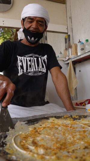 Mark Wiens Instagram - Street food in Dubai - Regag Bread with @mr.taster & @thefoodranger #Dubai #UAE #IranianFood