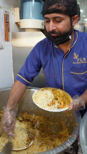 Mark Wiens Instagram - The amazing biryani @pakliyarirestaurant #Dubai, so moist and fragrant, full of spice, and paired with fluffy basmati.

With @thefoodranger @alinhamdani #UAE #biryani