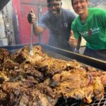 Mark Wiens Instagram - It was a huge honor to hang out with @pitmasterrodneyscott one of the worlds greatest whole hog pitmasters. My favorite move is when he mops it with vinegar pepper sauce, and literally spoons it out 🥄! Amazing bbq @rodneyscottsbbq #Charleston #SouthCarolina #bbq #wholehog Rodney Scott's BBQ