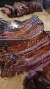 Mark Wiens Instagram - One of the greatest carne asada taquerias. The ribs are grilled, SHAVED 🪒 off the bone, chopped, and added to your taco 🌮!! Best of the best #Tucson #Arizona #tacos #MexicanFood @benniebustamante