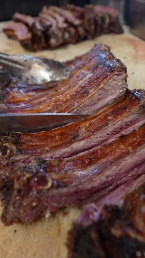 Mark Wiens Instagram - One of the greatest carne asada taquerias. The ribs are grilled, SHAVED 🪒 off the bone, chopped, and added to your taco 🌮!! Best of the best #Tucson #Arizona #tacos #MexicanFood @benniebustamante