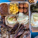 Mark Wiens Instagram - It was a huge honor to hang out with @pitmasterrodneyscott one of the worlds greatest whole hog pitmasters. My favorite move is when he mops it with vinegar pepper sauce, and literally spoons it out 🥄! Amazing bbq @rodneyscottsbbq #Charleston #SouthCarolina #bbq #wholehog Rodney Scott's BBQ
